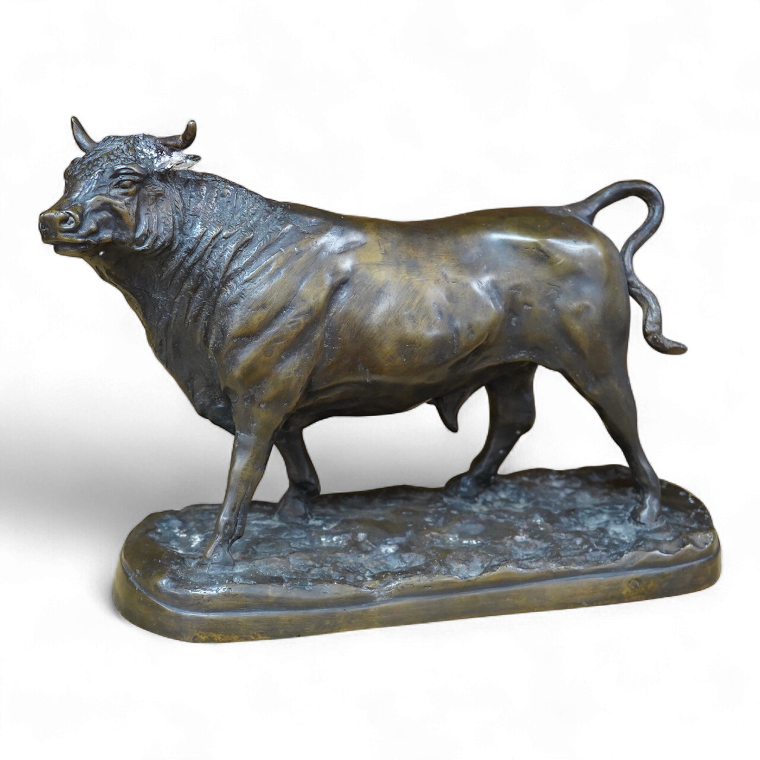 An Animalier style bronze model of a bull, unsigned, 33cm wide